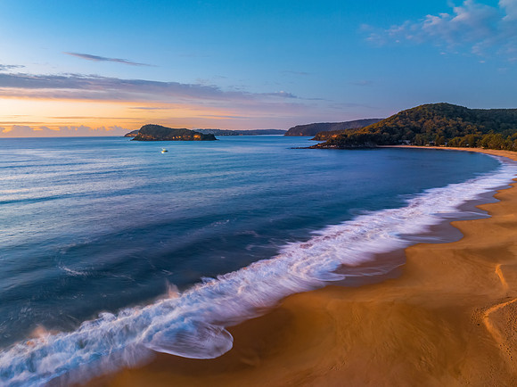 Aerial sunrise seascape with high cloud