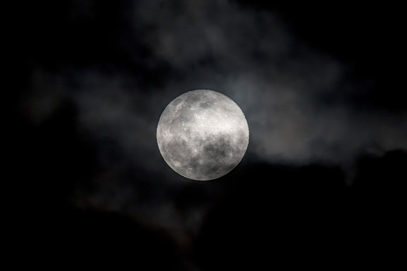 Cloud‑Covered Night Sky and the Full Moon