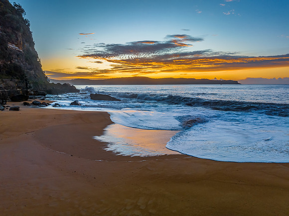 Aerial sunrise seascape with high cloud