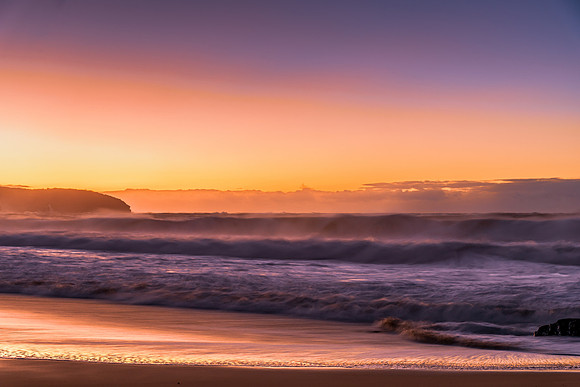 Sunrise and Waves - Surf's up at the seaside