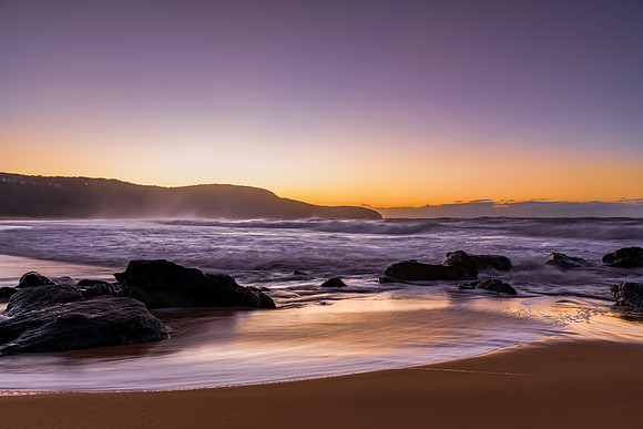 Sunrise and Waves - Surf's up at the seaside