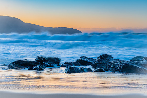 Sunrise and Waves - Surf's up at the seaside