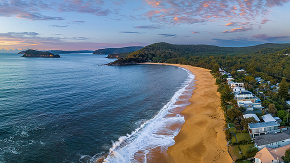 Aerial sunrise seascape with high cloud
