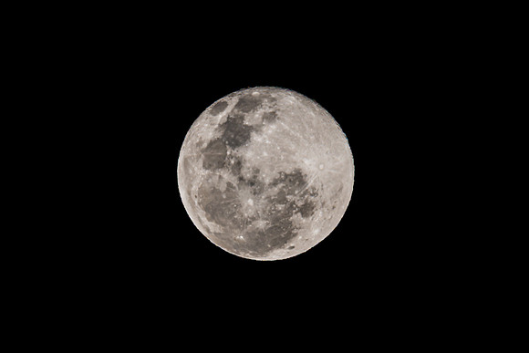 Cloud‑Covered Night Sky and the Full Moon