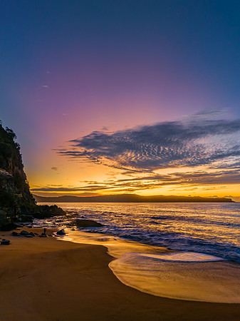 Aerial sunrise seascape with high cloud