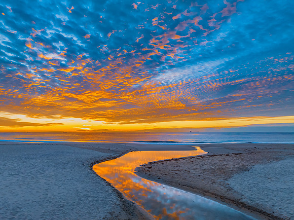 Sunrise at the seaside with beautiful cloudcover