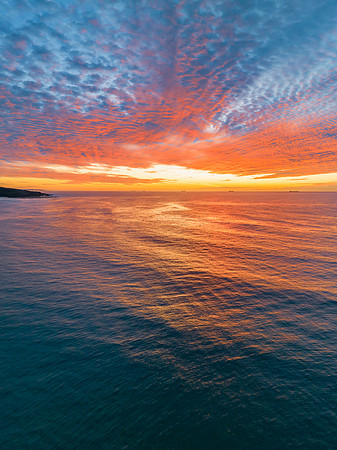 Sunrise at the seaside with beautiful cloudcover