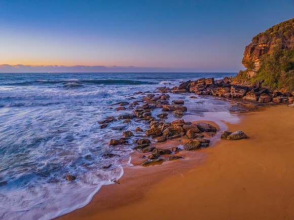 Sunrise and waves at the seaside