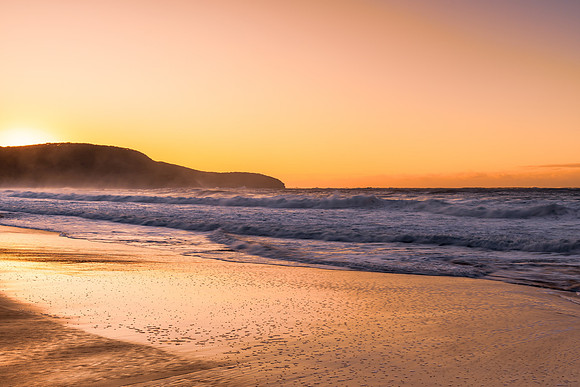 Sunrise and Waves - Surf's up at the seaside
