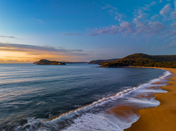 Aerial sunrise seascape with high cloud