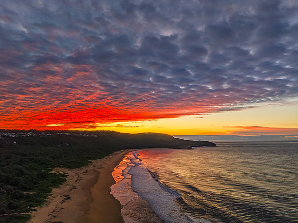 Winter seascape views over the beach with high and medium cloud
