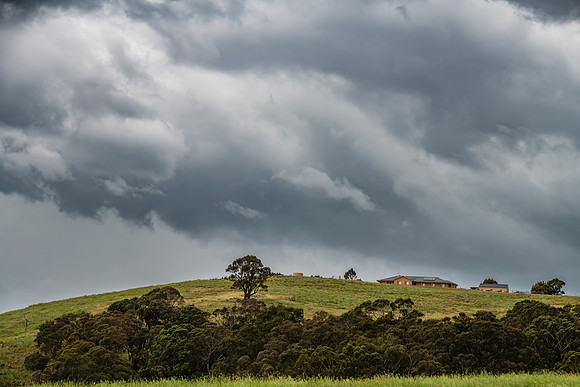 Afternoon storm clouds over the rural countryside