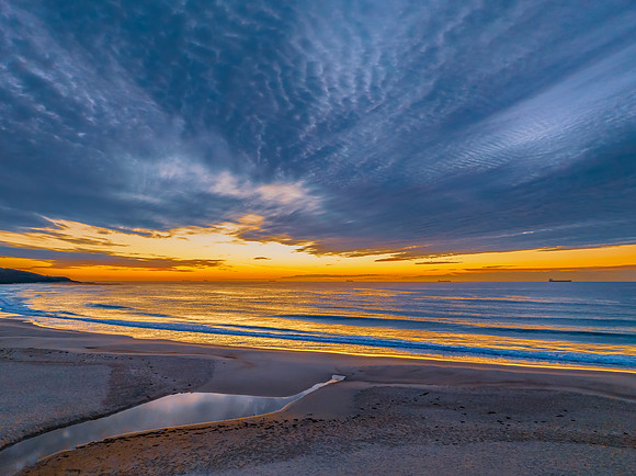 Sunrise at the seaside with beautiful cloudcover