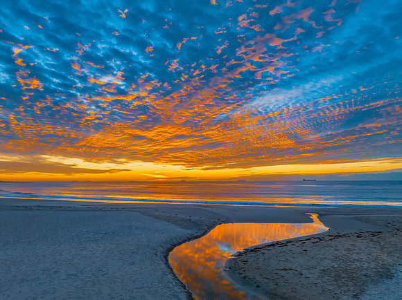 Sunrise at the seaside with beautiful cloudcover