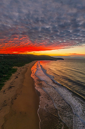 Winter seascape views over the beach with high and medium cloud
