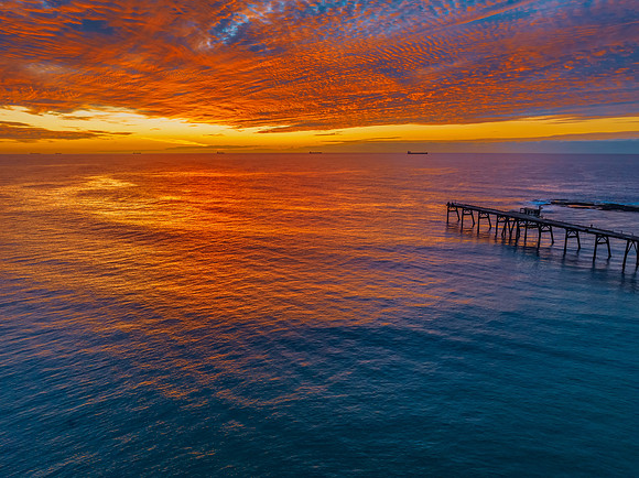 Sunrise at the seaside with beautiful cloudcover