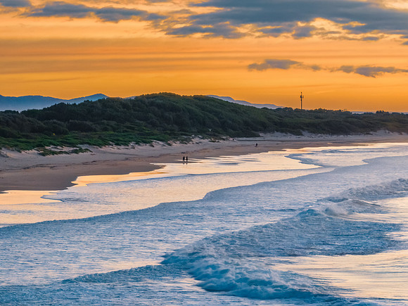 Sunrise seascape with waves