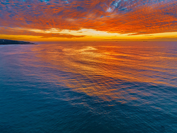 Sunrise at the seaside with beautiful cloudcover