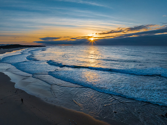 Sunrise seascape with waves