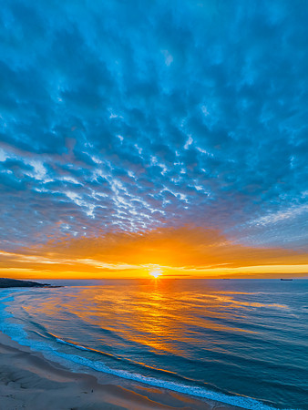 Sunrise at the seaside with beautiful cloudcover