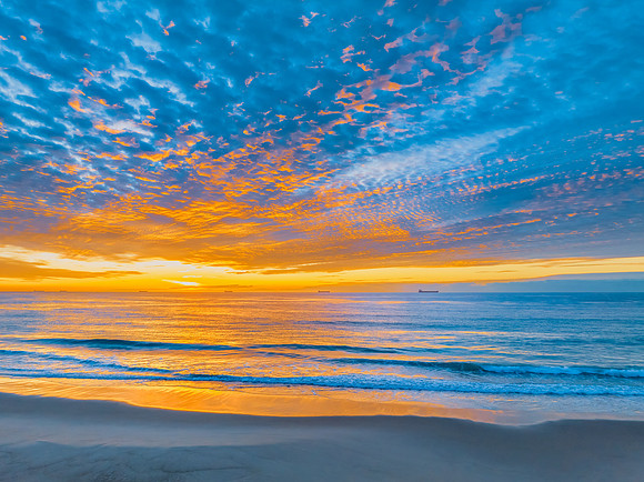 Sunrise at the seaside with beautiful cloudcover