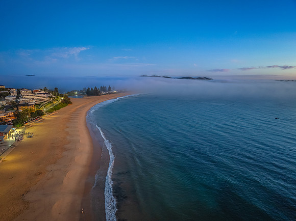 Foggy sunrise at the seaside