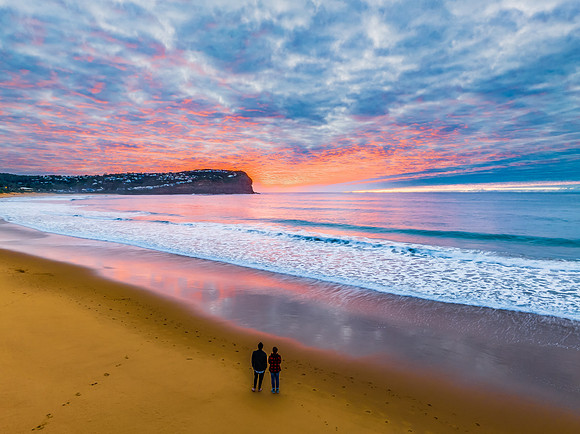 Stratus cloud filled sunrise over the ocean