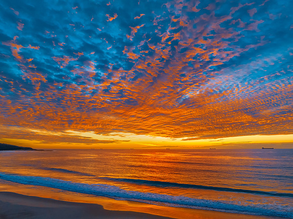 Sunrise at the seaside with beautiful cloudcover