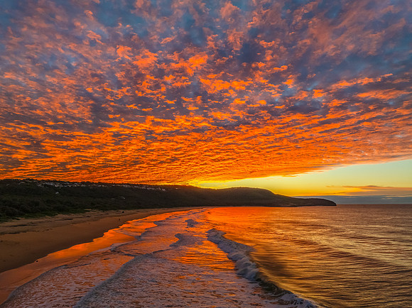 Winter seascape views over the beach with high and medium cloud