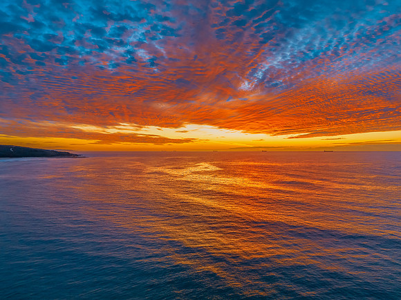 Sunrise at the seaside with beautiful cloudcover