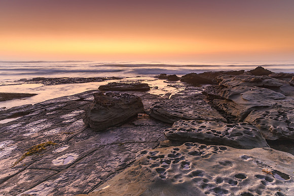 Sunrise Seascape and Rock Ledge in Soft Shades of Brown