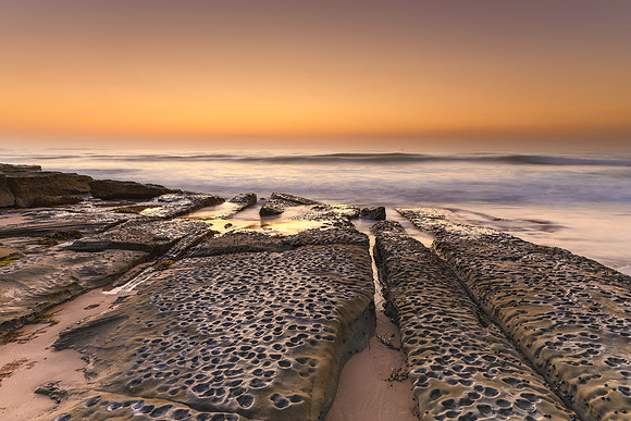 Sunrise Seascape and Rock Ledge in Soft Shades of Brown