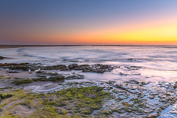 Sunrise Seascape and Rock Ledge with Soft Colours