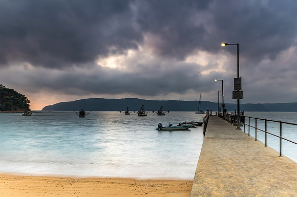Cloudy start to the day with wharf and boats