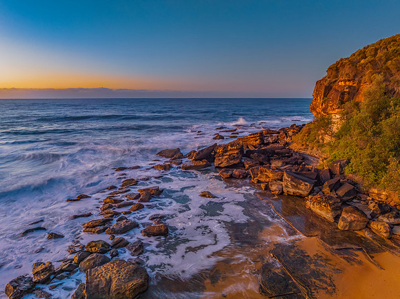 Sunrise and waves at the seaside