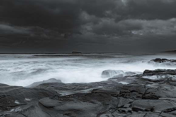 Rainy day moody seascape in monochrome