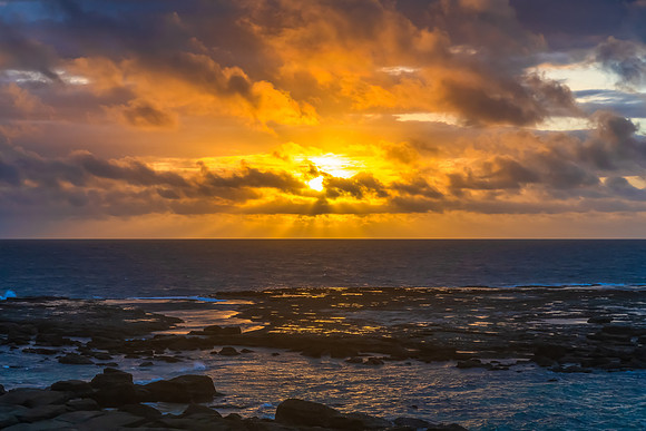 Sunrise seascape with strong southerly winds