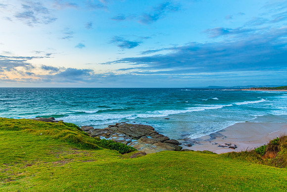 Sunrise seascape with strong southerly winds