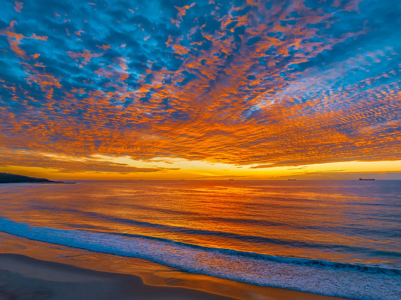 Sunrise at the seaside with beautiful cloudcover