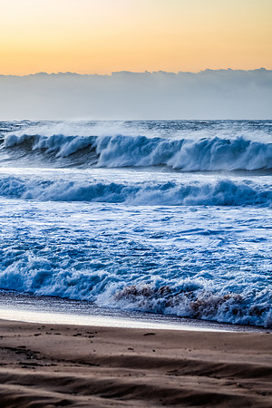 Sunrise and waves at the seaside