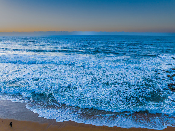 Sunrise and waves at the seaside