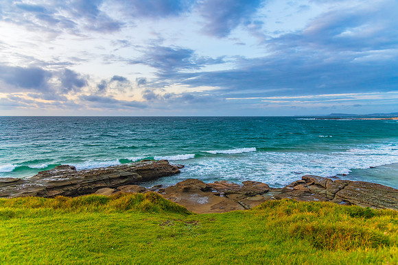 Sunrise seascape with strong southerly winds