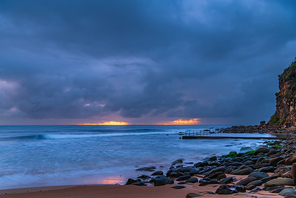 Wet weather sunrise seascape