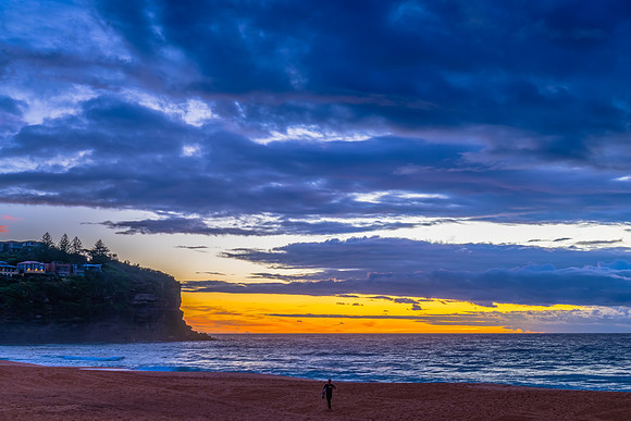 Sunrise at the Seaside with rain clouds