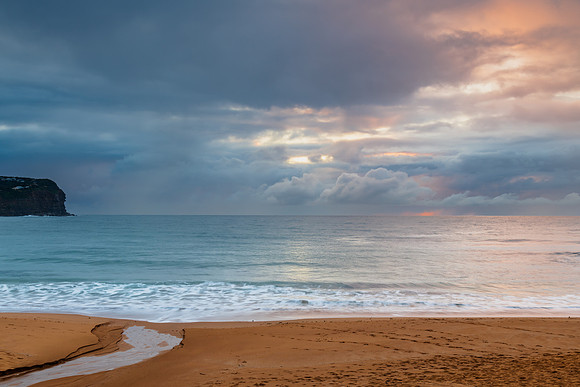 Wet weather sunrise seascape