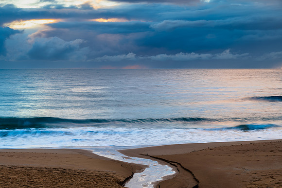 Wet weather sunrise seascape