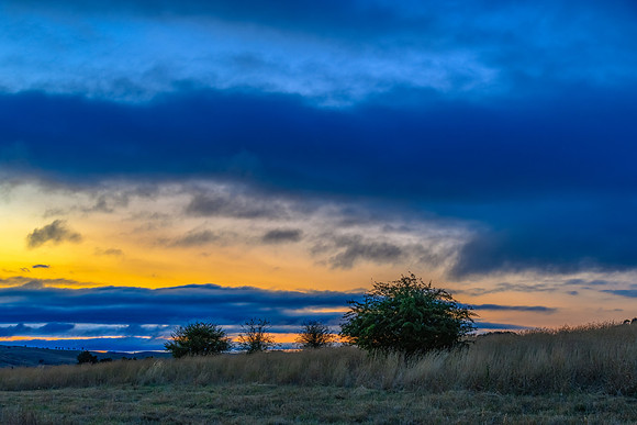 Sunset views over rural farmland with clouds