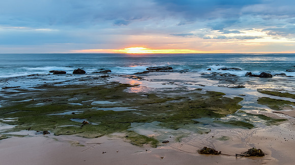 Cloudy Sunrise Seascape