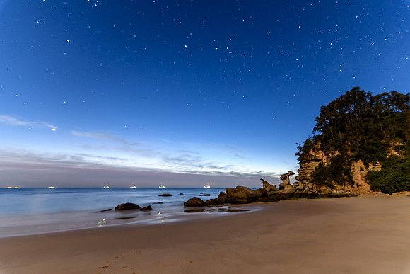 Rocky Seascape with Stars