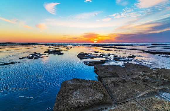 Rocky Sunrise Seascape
